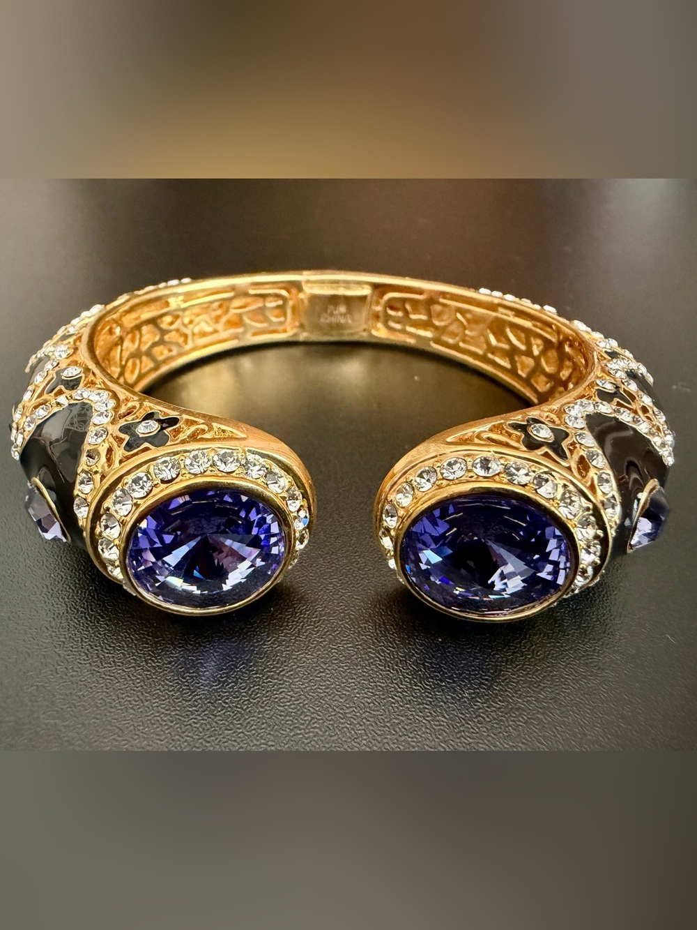 GOLD-TONE CUFF BRACELET WITH PURPLE CRYSTAL ACCENTS